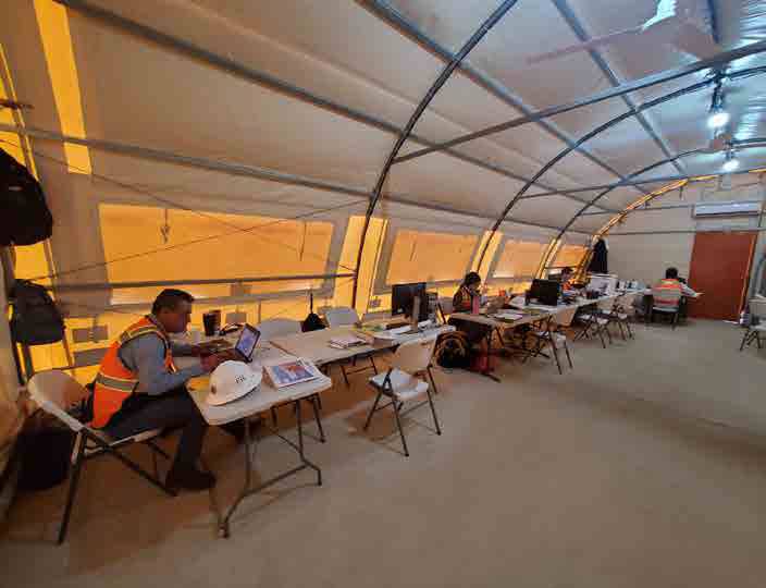 Camp office operations inside modular tent